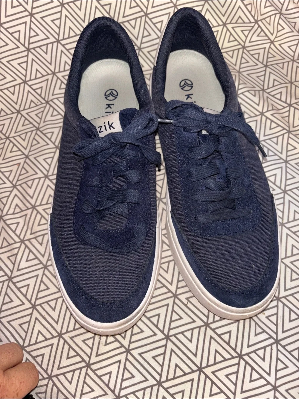Navy Low-Top Canvas Sneakers with White Sole slide on.